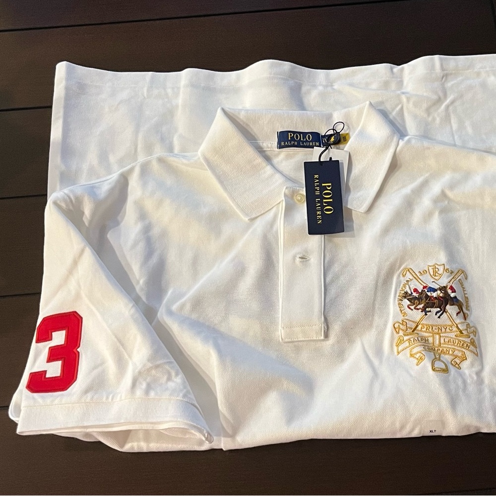 Ralph Lauren polo triple pony on the back.